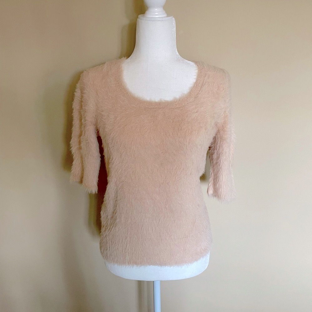 Anthropologie Women’s scoop neck sweater.